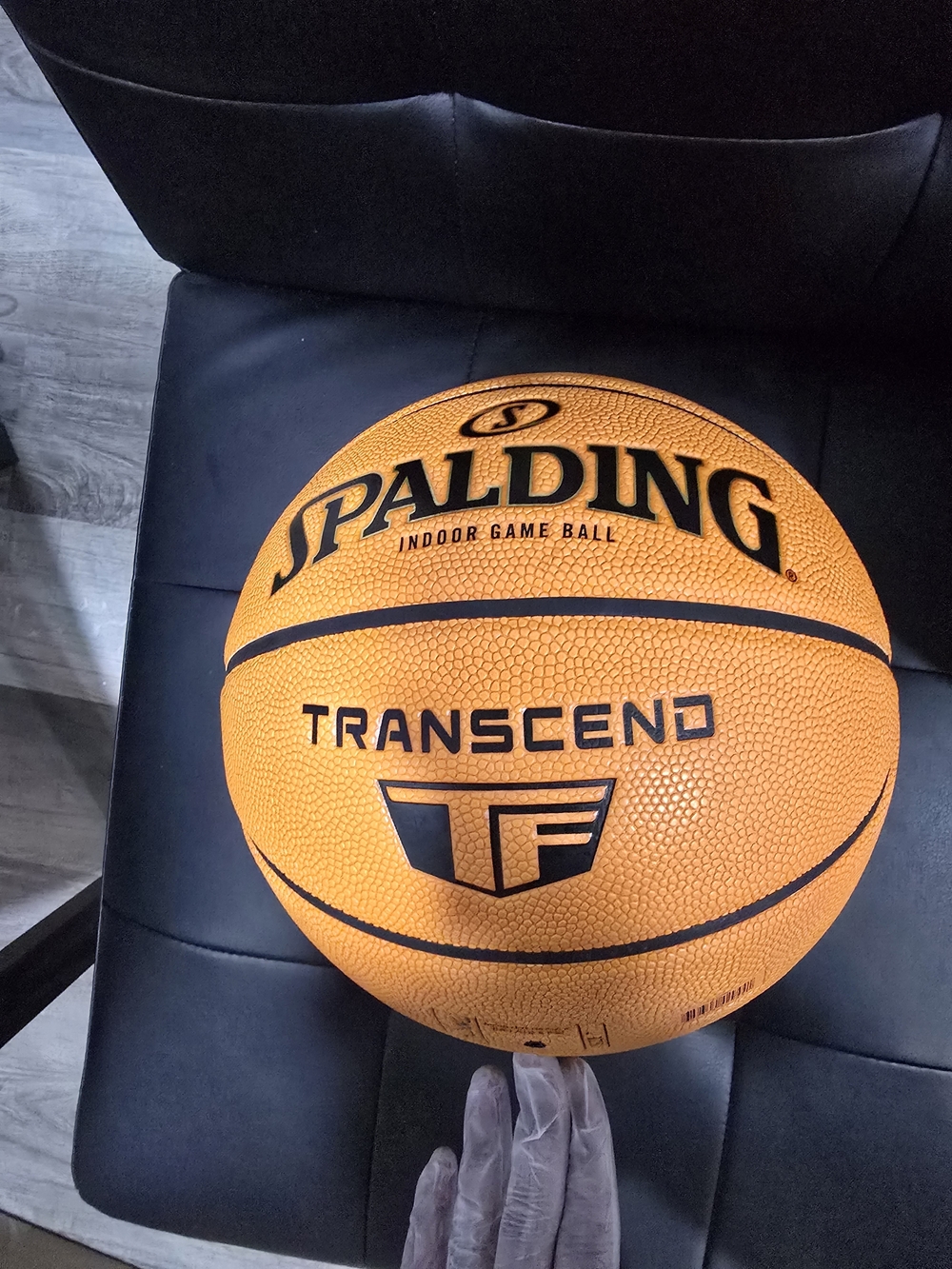 Spalding Orange Transcend Indoor Basketball with Black Logo